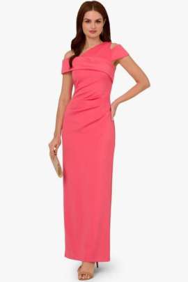 Un vestido con manga corta asimÃ©trica, que combina un diseÃ±o moderno y elegante. La asimetrÃ­a en las mangas le da un toque Ãºnico y contemporÃ¡neo, perfecto para un look casual-chic o para ocasiones especiales.